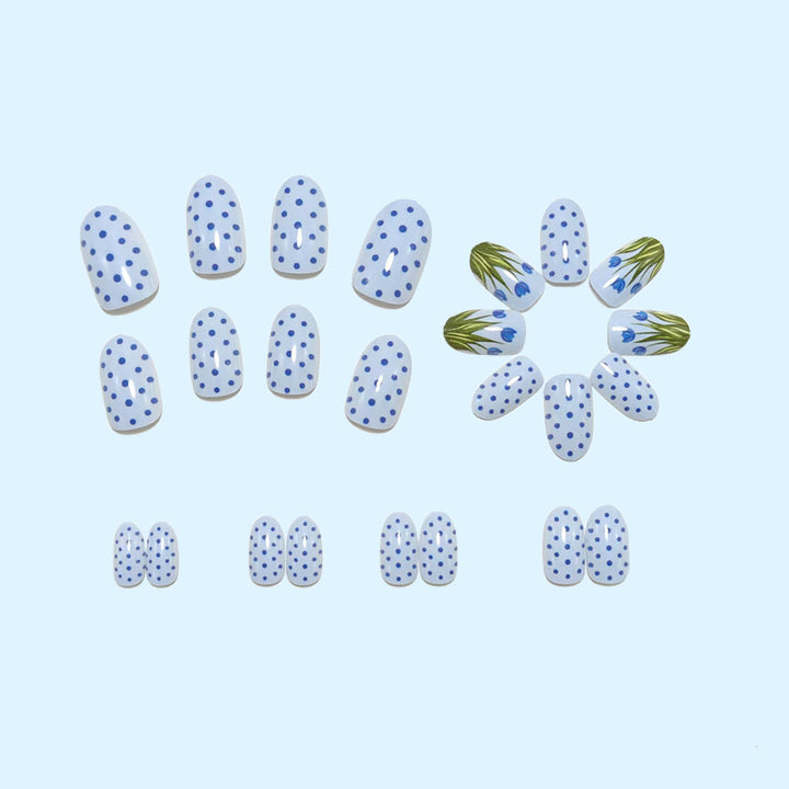 Creative art nails in an elegant polka dot design with floral accents Bowlift