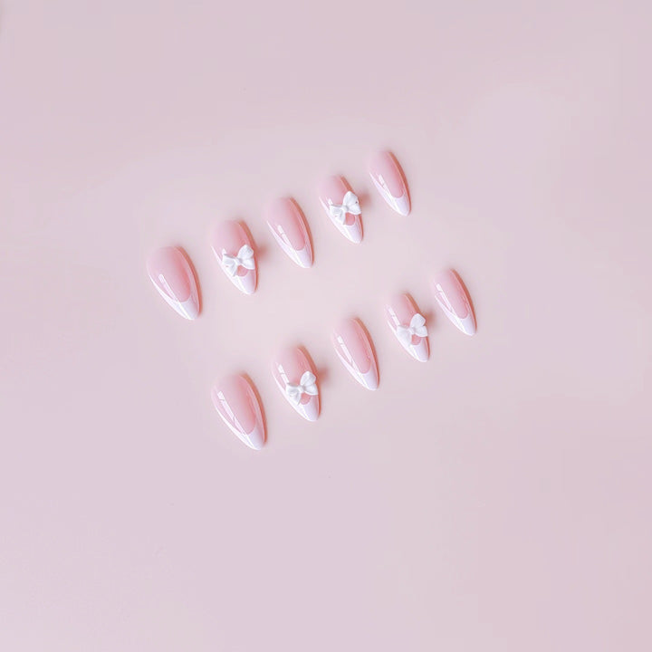 Artificial nail set with elegant 3D flowers and sparkling accents Bowlift