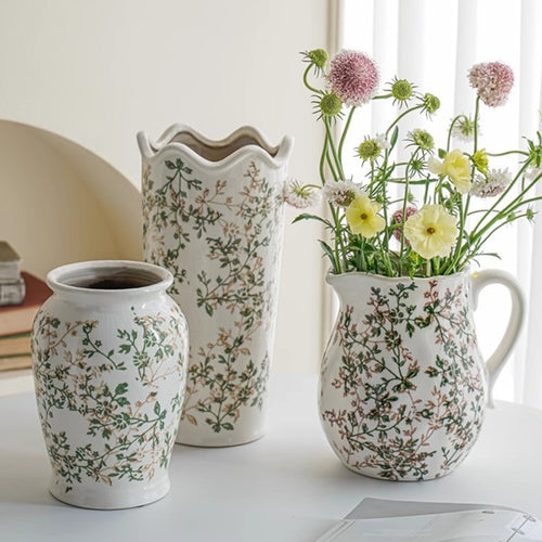 Handcrafted ceramic vase with floral motifs Bowlift