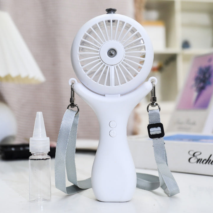 Women's portable handheld fan with ergonomic design and spray function Bowlift