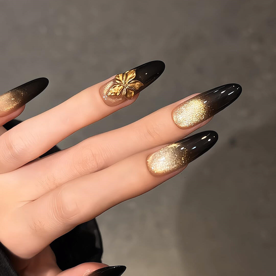 Glamorous artificial nails with intricate flower and glitter effects Bowlift