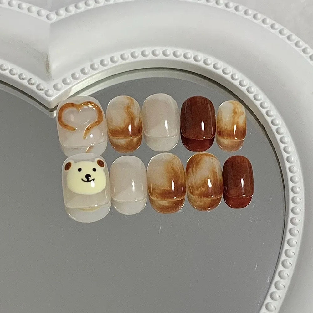 Artificial nails with cute bear design and marbled pattern Bowlift