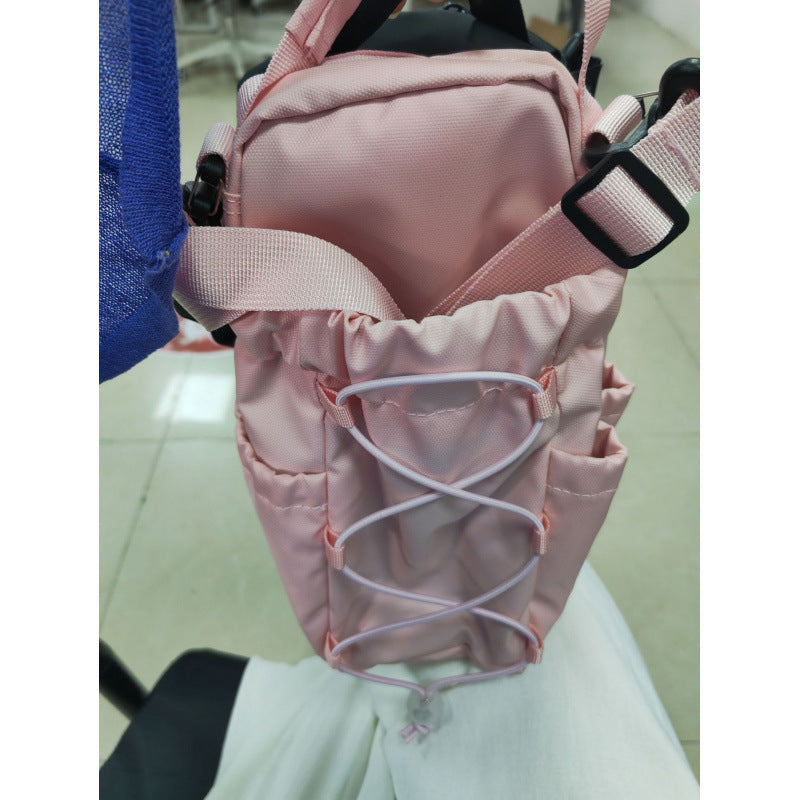 Multifunctional backpack with padded carrying handles and multiple compartments Bowlift