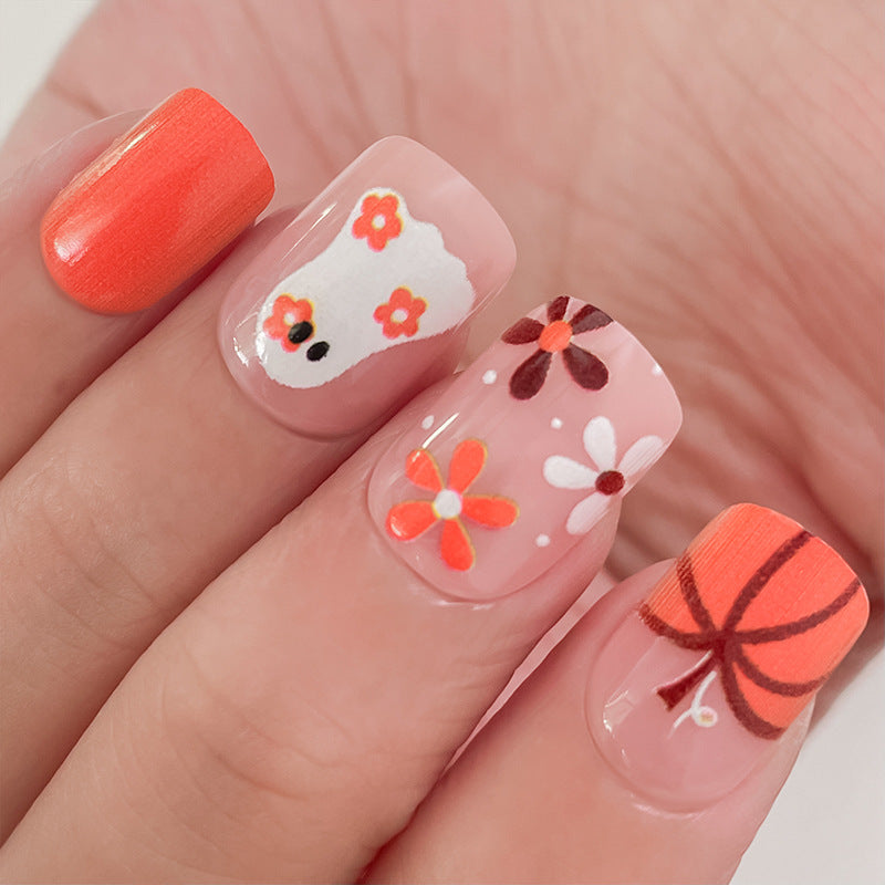 Artistic Press-On Nail Set with Halloween Themed Designs Bowlift