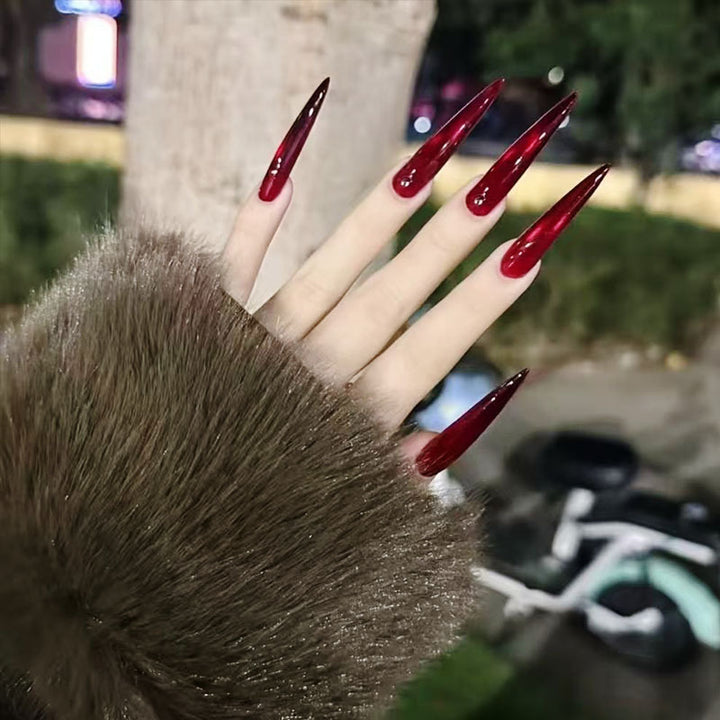 Artistic Long Stiletto Nail Enhancements Bowlift