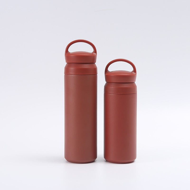Women's premium insulated drinking bottle with ergonomic grip Bowlift