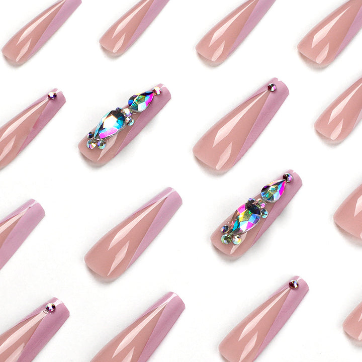 Artful nail extensions with rhinestone and flower accents Bowlift
