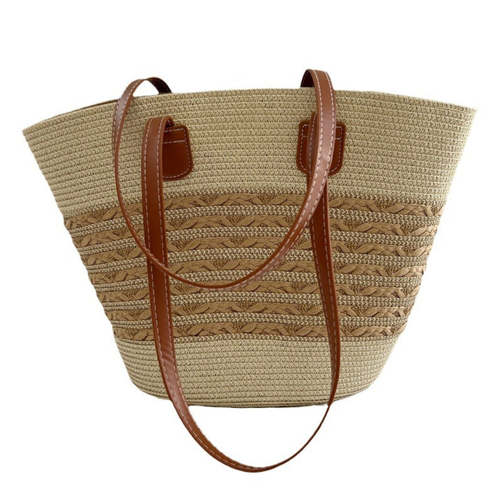 Handcrafted wicker bag with elegant leather accents Bowlift