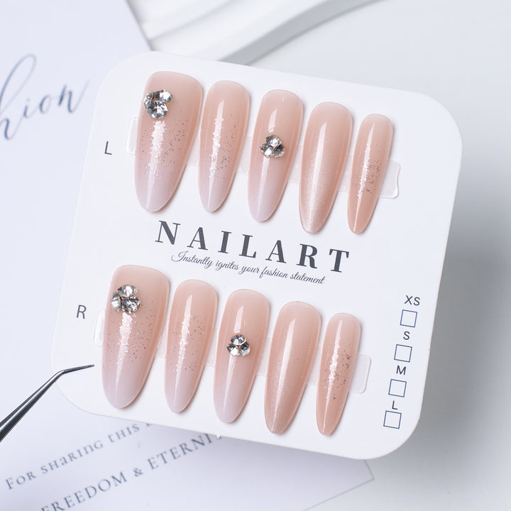 Decorative Press-On Nail Extensions with Bow and Rhinestone Accents Bowlift