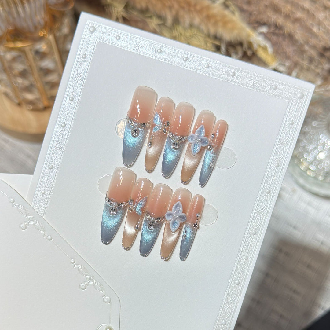 Artistic Press-On Nail Set with Floral and Gemstone Accents Bowlift