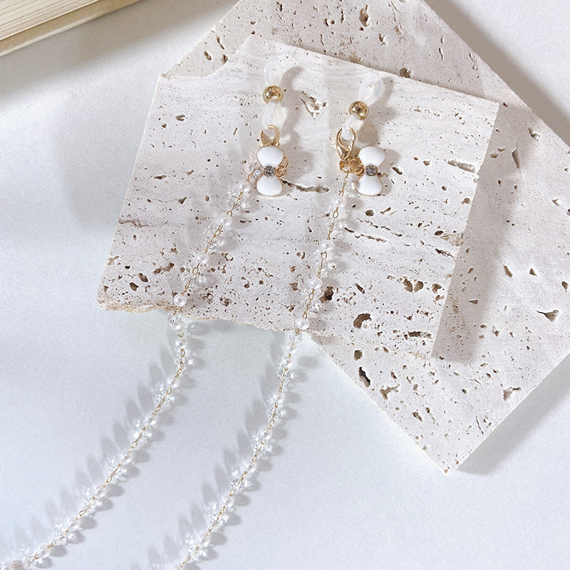 Elegant earrings with pearls and flower pendants Bowlift