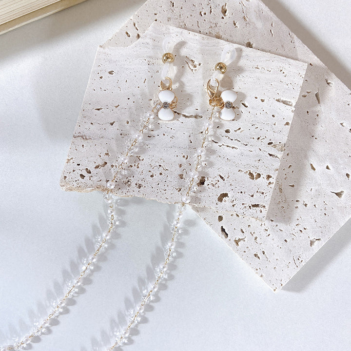 Elegant earrings with pearls and flower pendants Bowlift