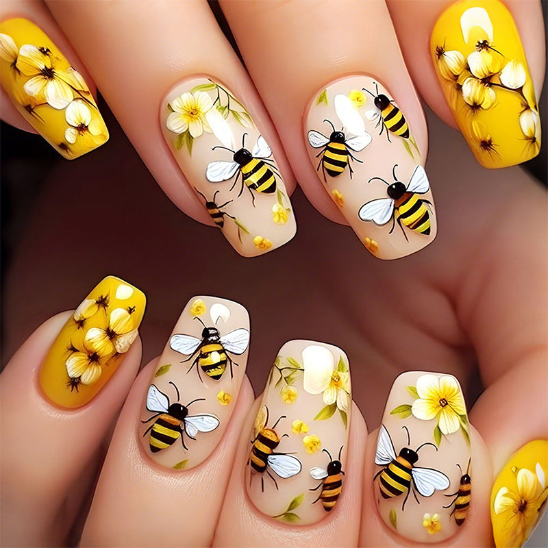 Artificial nail set with floral and bee motifs Bowlift