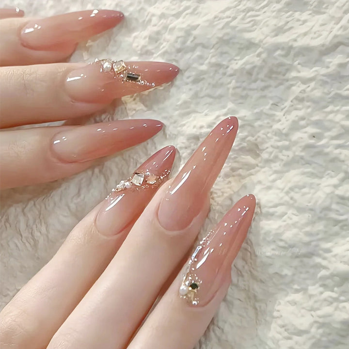 Artificial nail set with elegant ombre effect and glamorous embellishments Bowlift