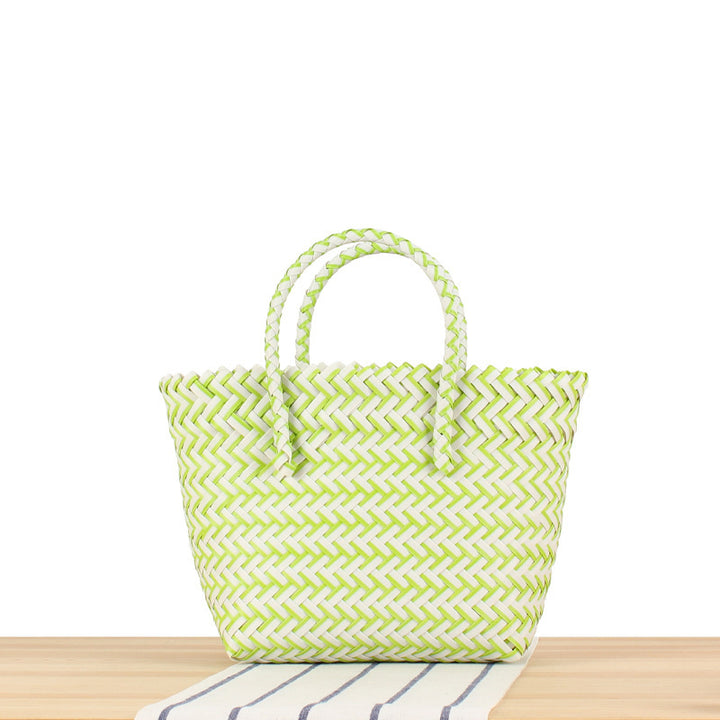 Tote bag made of handwoven natural material with braided design Bowlift