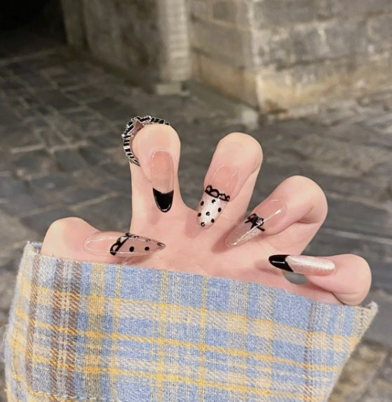 Artistic Press-On Nail Set with Whimsical Character Designs Bowlift