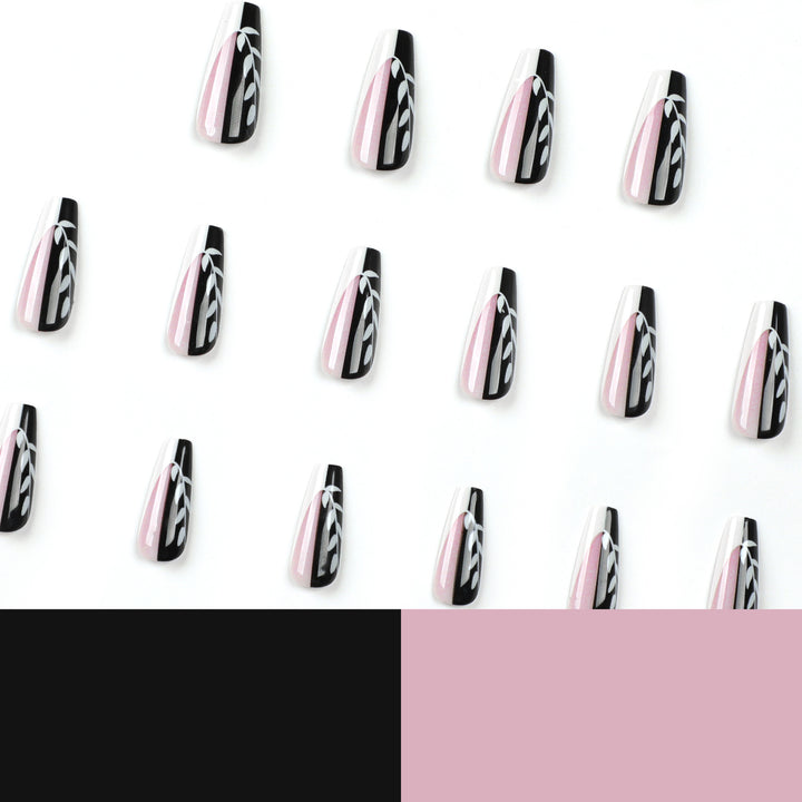 Artful nail extensions in elegant black and white design Bowlift