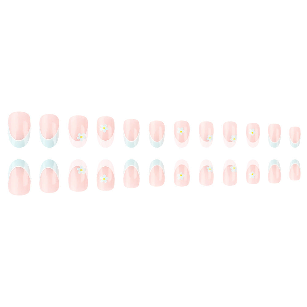 Elegant French Tip Press-On Nails with Floral Accents Bowlift