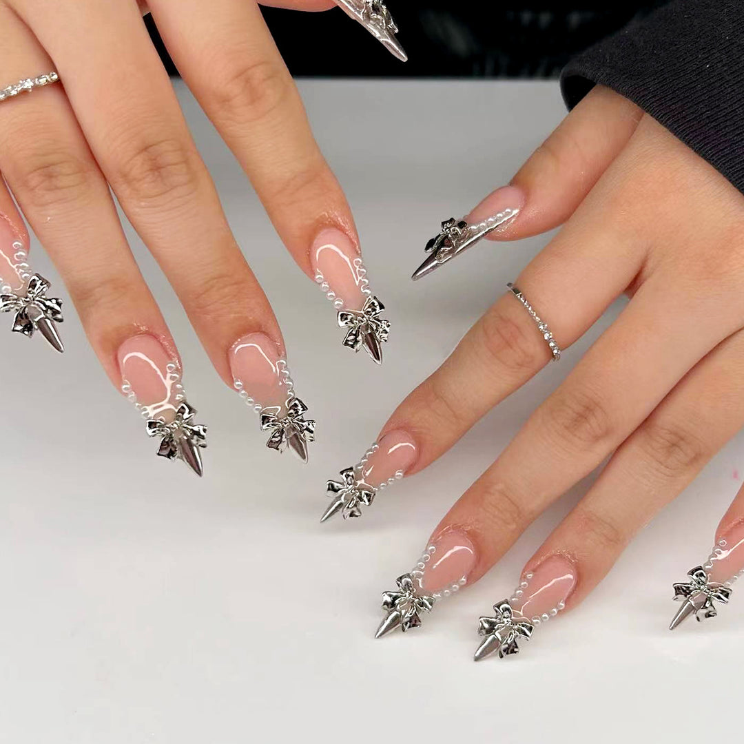 Glamorous artificial nails with decorative accents Bowlift