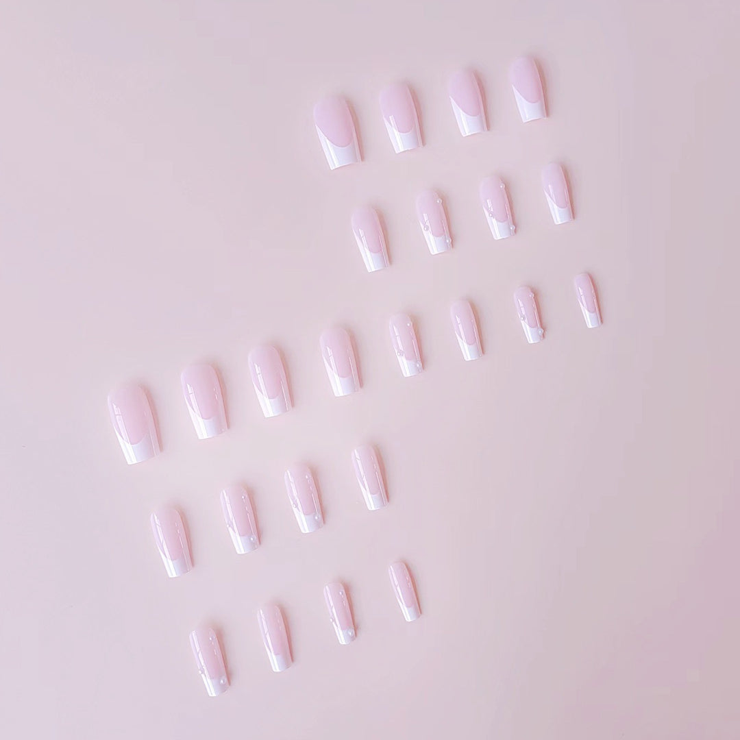 Artificial nail tips with elegant pearl accents Bowlift