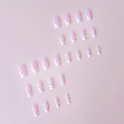 Artificial nail tips with elegant pearl accents Bowlift