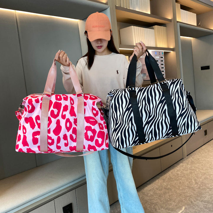 Sporty travel bag with trendy zebra pattern Bowlift