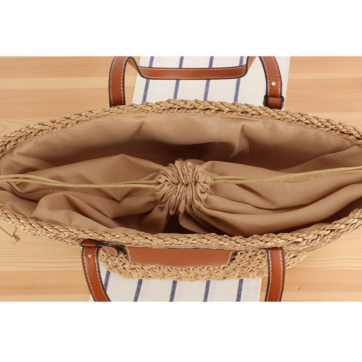 Braided bast bag with leather application Bowlift