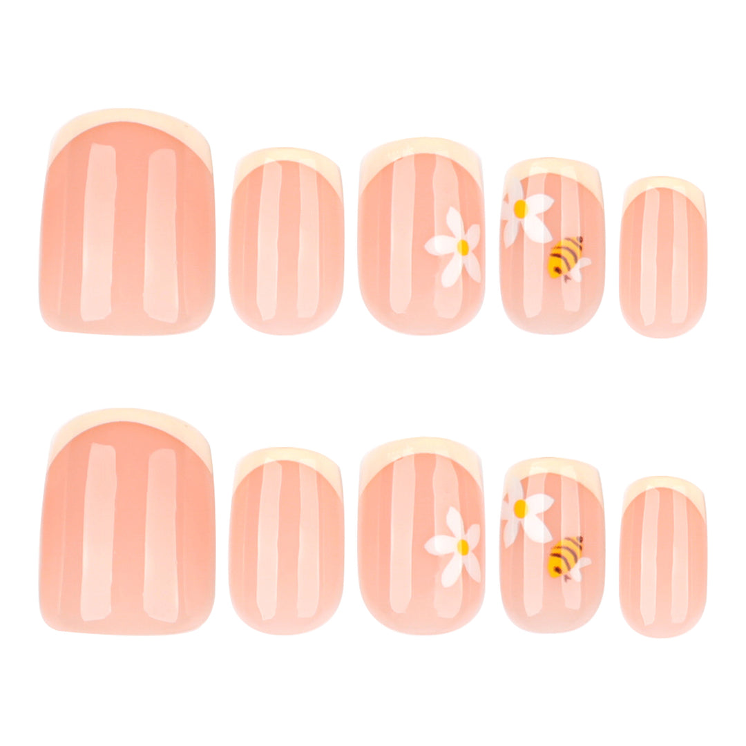 Artificial nail art with flower and bee motifs Bowlift