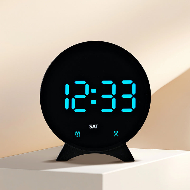 Digital alarm clock with large LED display and adjustable light sensor Bowlift