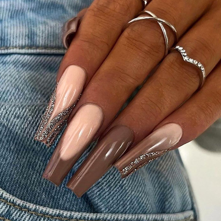 Artful gel nails with elegant rhinestone embellishments Bowlift
