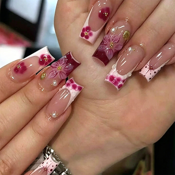 Elegant artificial nails with hand-painted floral accents Bowlift