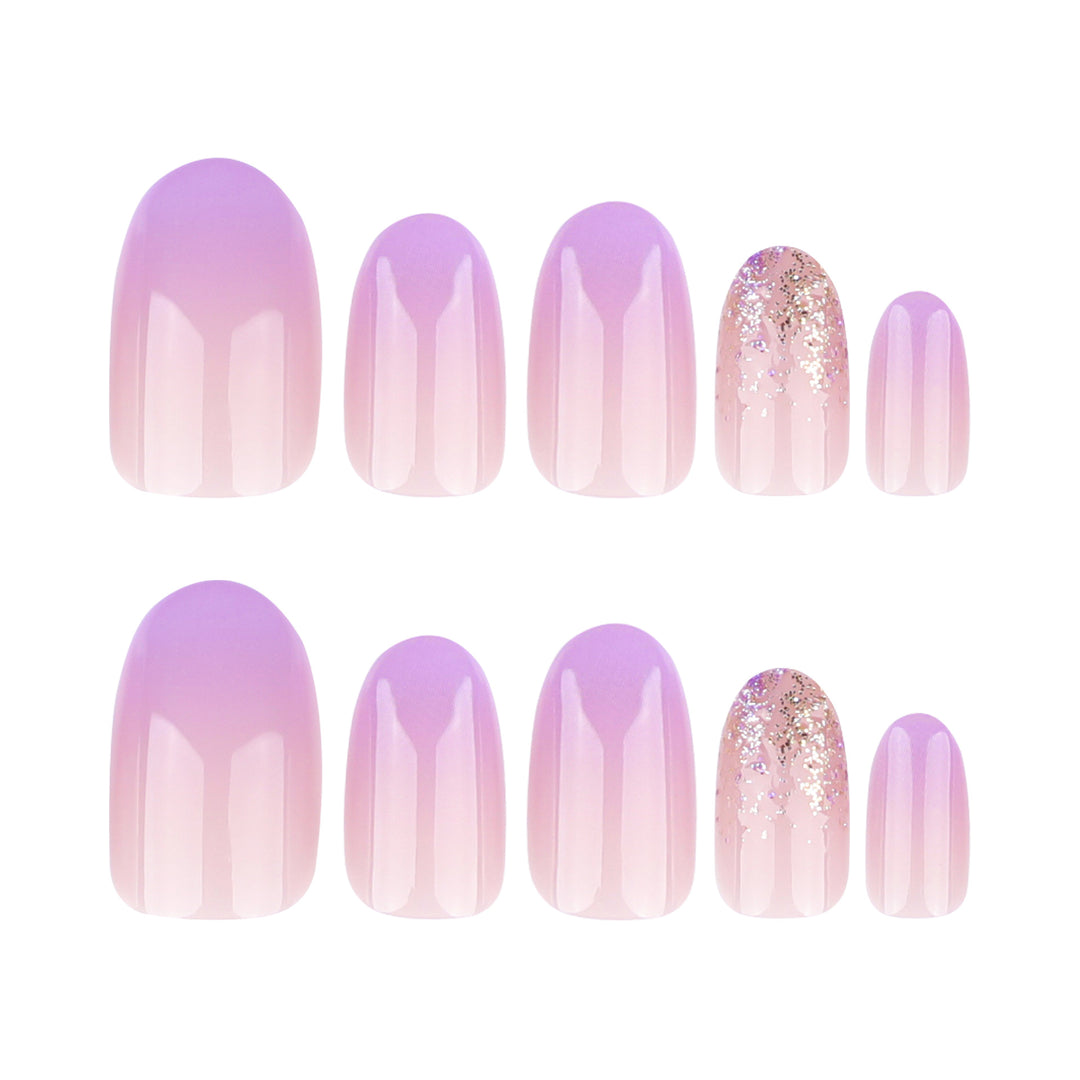 Artful nail art with ombre design and glitter accents Bowlift