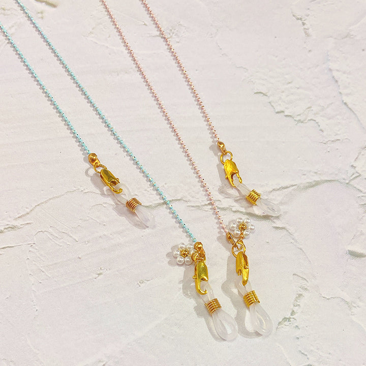 Eyewear chain with pearls and gold pendants Bowlift