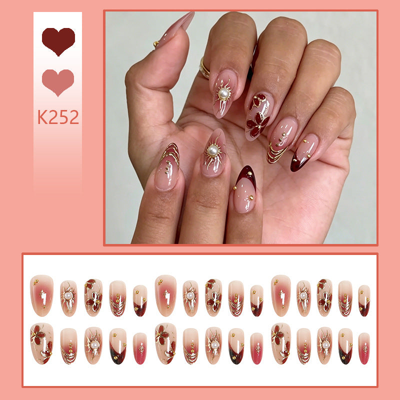 Elegant Artificial Nail Collection with Glitter Motifs Bowlift