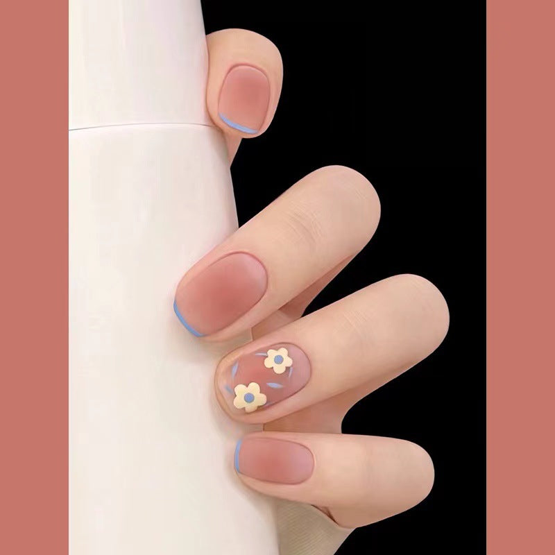 Creative nail design with floral accents Bowlift
