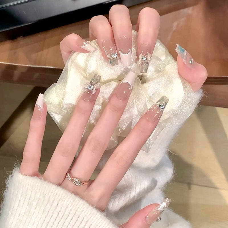 Glamorous artificial nails with glitter design Bowlift