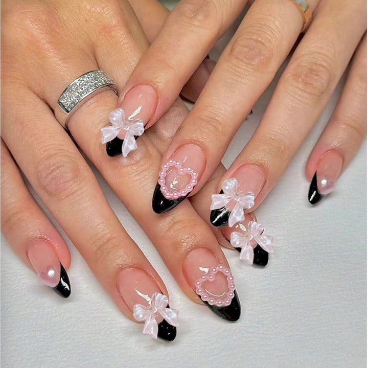 Glamorous artificial nail tips with 3D bows and heart decorations Bowlift