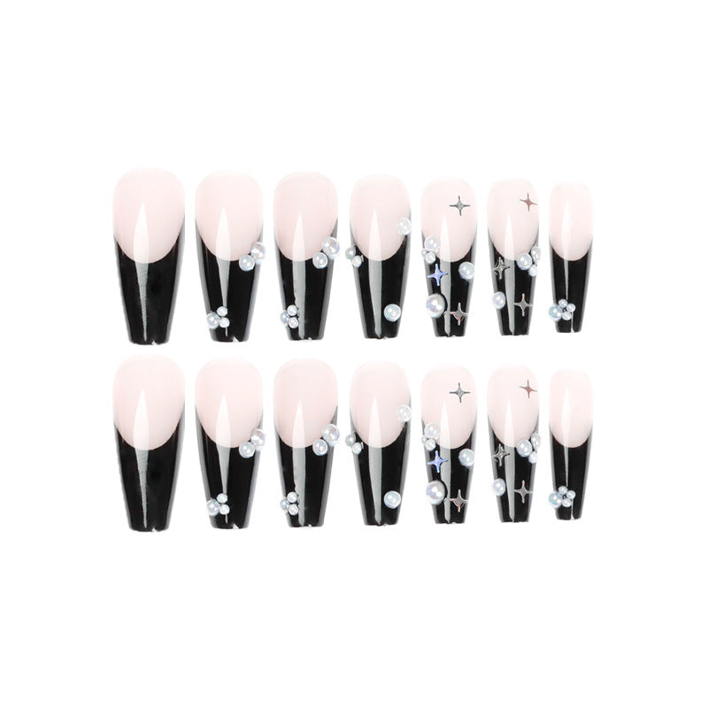Artificial nail art with pearl and shine elements Bowlift