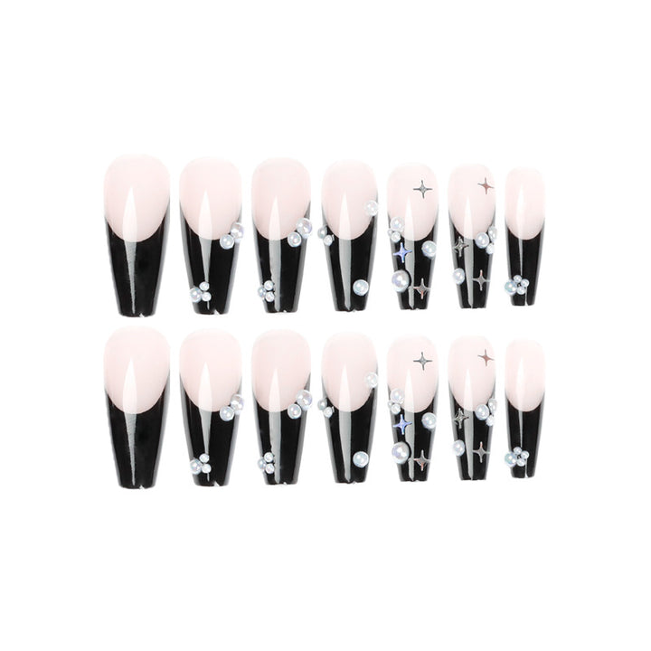Artificial nail art with pearl and shine elements Bowlift