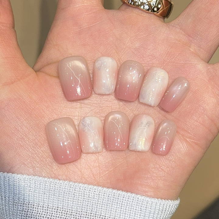 Artificial nails with elegant gradient colors and holographic accents Bowlift