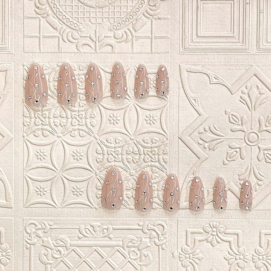 Decorative Stiletto Press-On Nails with Rhinestone Accents Bowlift