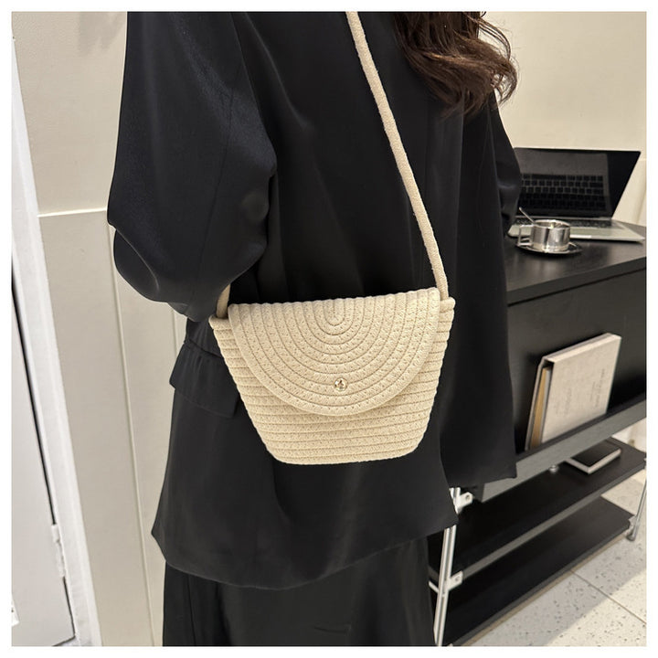 Hand-knotted mini bag with curved design Bowlift