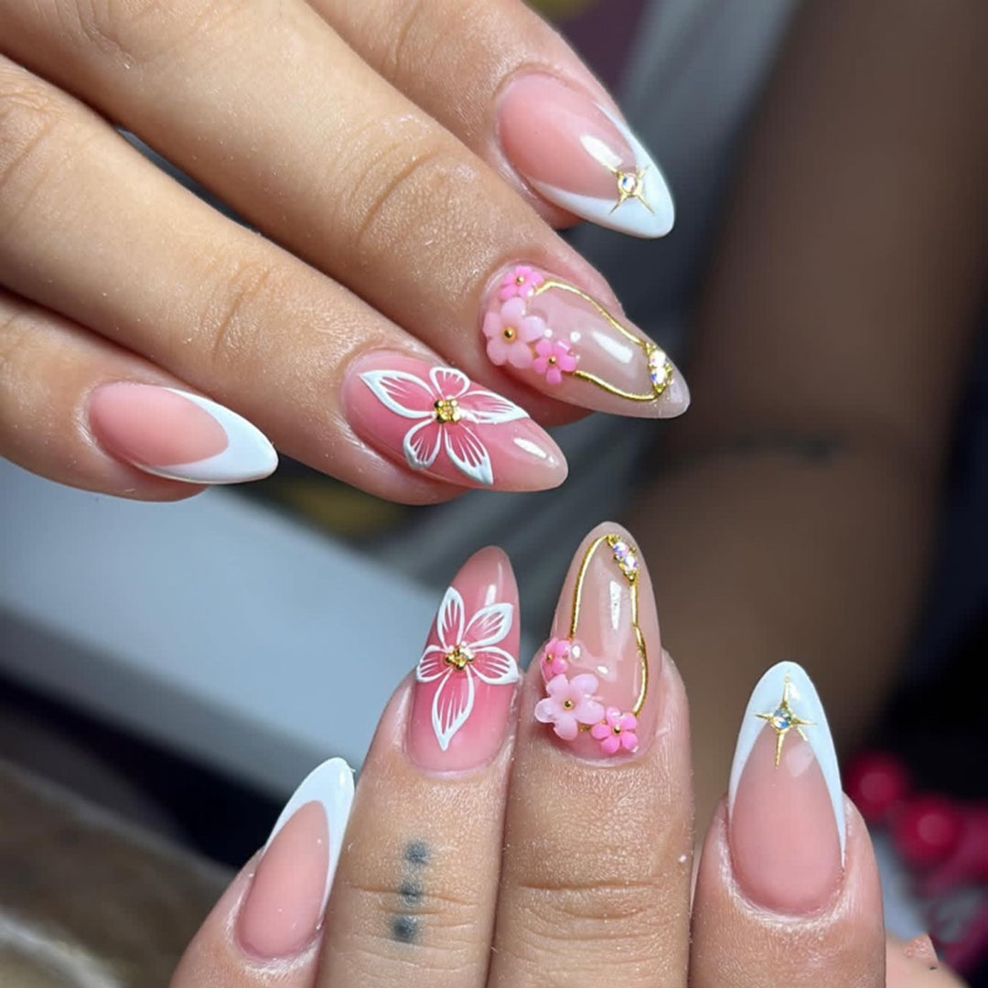 Artful acrylic nails with elegant floral accents Bowlift