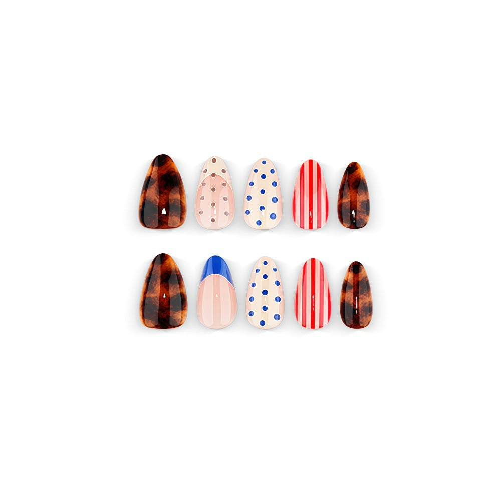Fake nails in playful design with dots and stripes Bowlift