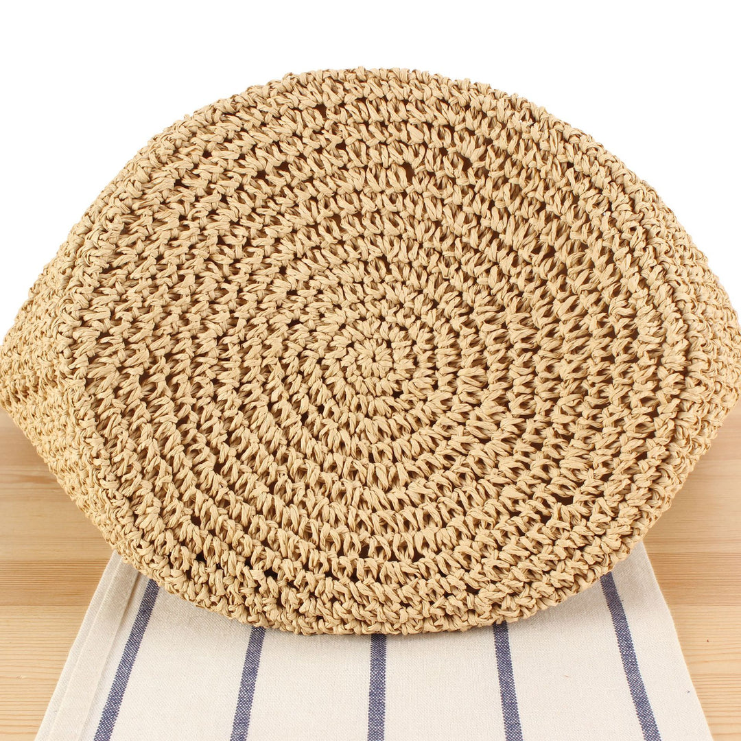 Hand-knotted beach bag with floral details Bowlift