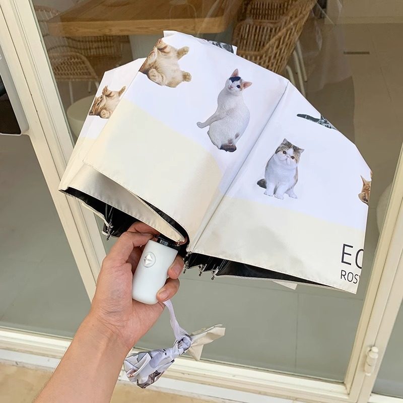 Ladies folding umbrella with playful animal design Bowlift
