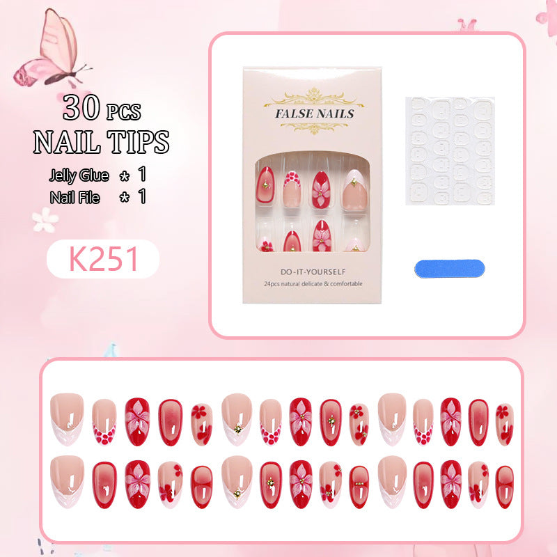 Artificial nails with floral design and glamorous accents Bowlift