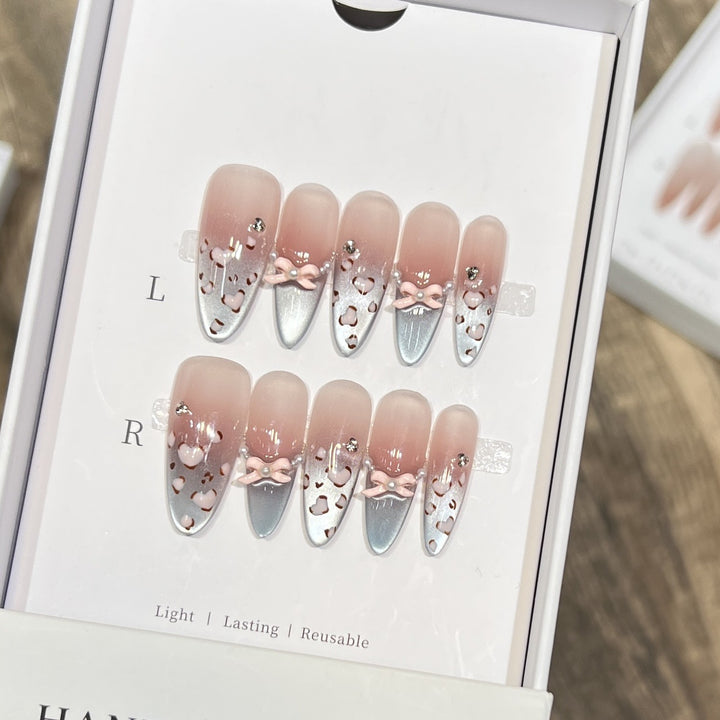 Decorative Press-On Nail Design with Bow Accents Bowlift