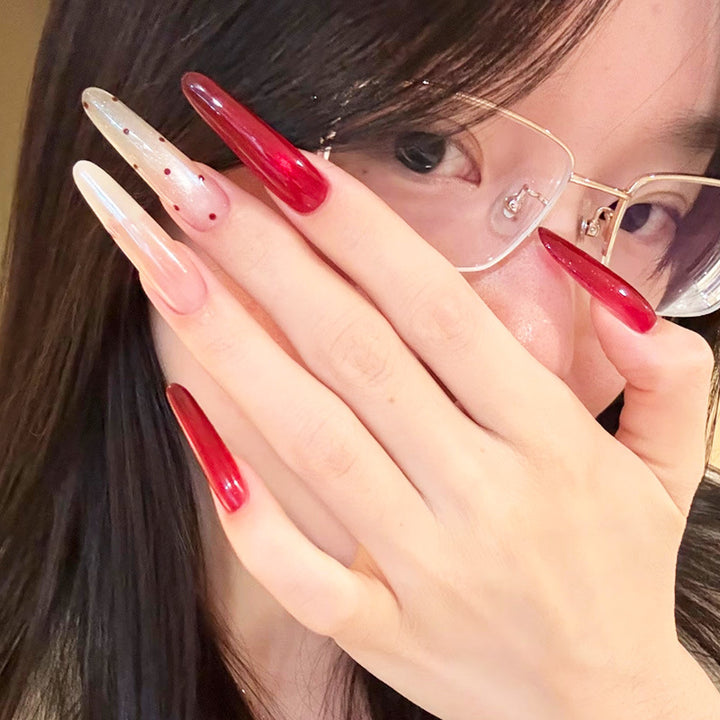 Artistic Long Stiletto Nail Enhancements Bowlift