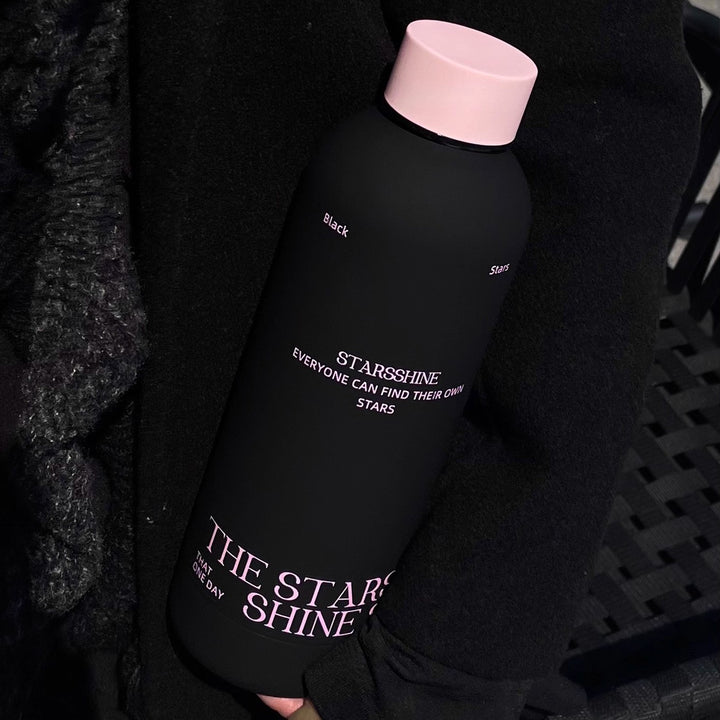 Women's insulated bottle with ergonomic design and practical carrying strap Bowlift
